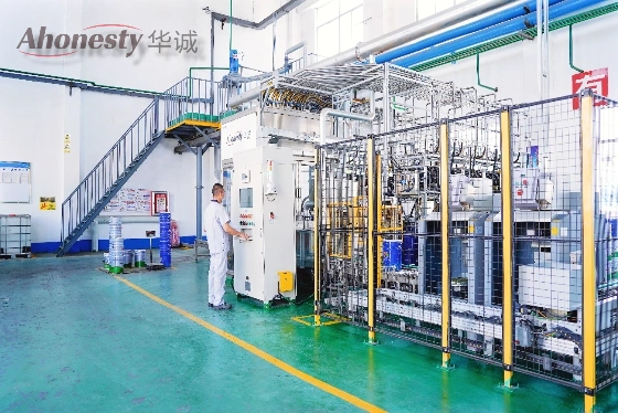 Modern production line in Huacheng factory for water-based industrial coatings, featuring clean workshop, automated equipment, and controlled manufacturing process.